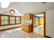 Bright eat-in kitchen with tile floors, natural light, and views of the backyard at 6780 E Woodland Ct, Mooresville, IN 46158