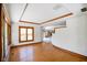 Living room with hardwood floors and large windows providing plenty of natural light at 6780 E Woodland Ct, Mooresville, IN 46158