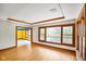 Bright living space with hardwood floors, tray ceiling and large picture windows at 6780 E Woodland Ct, Mooresville, IN 46158