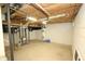 Unfinished basement with exposed insulation and mechanical systems at 701 E Main St, Westfield, IN 46074