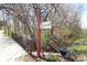 Scenic property view showing a vintage bridge and stream amidst lush natural surroundings at 701 E Main St, Westfield, IN 46074