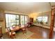 Inviting dining area showcasing wood floors, large windows, and abundant natural light at 701 E Main St, Westfield, IN 46074