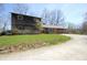 Beautiful combination brick and cedar home with spacious front lawn at 701 E Main St, Westfield, IN 46074