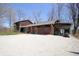 Beautiful combination brick and cedar home with attached garage and car port at 701 E Main St, Westfield, IN 46074