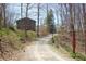 Secluded wooded lot featuring charming home and separate smaller dwelling at 701 E Main St, Westfield, IN 46074