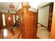Grand foyer showcasing beautiful hardwood floors and ornate woodwork at 701 E Main St, Westfield, IN 46074