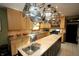 Modern kitchen featuring stainless steel appliances, granite countertops, and ample cabinet space at 701 E Main St, Westfield, IN 46074