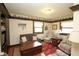 Comfortable living room with built-in shelving, soft seating, and natural light from the windows at 701 E Main St, Westfield, IN 46074