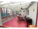 Relaxing outdoor patio featuring a covered area with a ceiling fan and spacious seating at 701 E Main St, Westfield, IN 46074