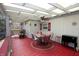 Charming outdoor patio with covered seating, ceiling fan, and ample space for entertaining at 701 E Main St, Westfield, IN 46074