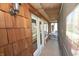 Cozy screened porch featuring wood flooring and walls, providing an outdoor living space at 701 E Main St, Westfield, IN 46074