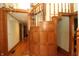 Exquisite curved wood staircase featuring detailed wood work adding a touch of elegance at 701 E Main St, Westfield, IN 46074
