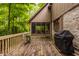 Wood deck with railing and outdoor grill and seating at 7249 Tuliptree Trl, Indianapolis, IN 46256