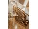 Spacious foyer with hardwood floors and staircase showcases an open, inviting layout at 7249 Tuliptree Trl, Indianapolis, IN 46256