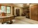 Finished office space with window, carpet, desk, and bookshelf at 7249 Tuliptree Trl, Indianapolis, IN 46256