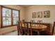 Dining room with a large window, matching furniture, and space for dinner parties at 757 Howe Dr, Carmel, IN 46032