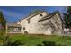 Exterior of a charming two-story home with a well-maintained yard and mature trees at 757 Howe Dr, Carmel, IN 46032