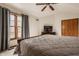 Bedroom with a vaulted ceiling, neutral walls, and windows allowing ample natural light at 757 Howe Dr, Carmel, IN 46032