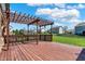 Large back deck with pergola is perfect for outdoor living at 7637 Sand Run Ct, Indianapolis, IN 46259