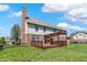 Back of home and spacious yard with deck and pergola for outdoor enjoyment at 7637 Sand Run Ct, Indianapolis, IN 46259