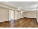 Spacious basement with recessed lighting, wood floors, and neutral walls ready for customization at 7637 Sand Run Ct, Indianapolis, IN 46259