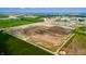 Expansive aerial view of a developing community, showing future homesites and green spaces at 792 Oakleaf Dr, Greenfield, IN 46140