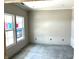 A versatile room with neutral paint, recessed lighting, and a large window for ample natural light at 792 Oakleaf Dr, Greenfield, IN 46140