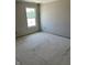 Well-lit room with a large window, offering a bright and airy atmosphere for relaxation or work at 792 Oakleaf Dr, Greenfield, IN 46140