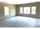 Bright room featuring large windows, neutral walls, and a spacious layout ready for customization at 792 Oakleaf Dr, Greenfield, IN 46140