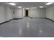 Expansive basement features neutral decor, closets, and utility hookups at 809 S Harrison St, Alexandria, IN 46001