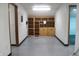 Large hallway with ample lighting, built in storage solutions, and easy access to other spaces at 809 S Harrison St, Alexandria, IN 46001