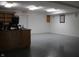 This bright office space features recessed lighting, light colored walls, and an exit sign for safety at 809 S Harrison St, Alexandria, IN 46001