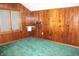 Cozy office space with wood paneling, a window, and ample natural light at 809 S Harrison St, Alexandria, IN 46001