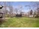 Spacious backyard featuring a trampoline and room for outdoor activities at 8180 E County Road 400 N, Brownsburg, IN 46112
