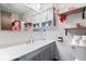 Clean bathroom with a mirror, shelf, and essential toiletries stocked neatly at 8180 E County Road 400 N, Brownsburg, IN 46112
