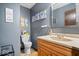 Well-lit bathroom with a modern vanity, framed artwork, and a clean, functional layout at 8180 E County Road 400 N, Brownsburg, IN 46112