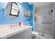 Modern bathroom with a sleek vanity, glass-enclosed shower, and contemporary fixtures at 8180 E County Road 400 N, Brownsburg, IN 46112