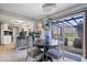 Dining room with sliding glass doors to the backyard and views of the kitchen at 8180 E County Road 400 N, Brownsburg, IN 46112