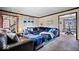 Comfortable living room featuring a sectional sofa and a view into the dining area at 8180 E County Road 400 N, Brownsburg, IN 46112