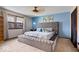 Serene bedroom with a plush upholstered bed frame and headboard, creating a luxurious feel at 8180 E County Road 400 N, Brownsburg, IN 46112