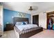 Bright bedroom with a plush upholstered headboard and serene decor, creating a relaxing atmosphere at 8180 E County Road 400 N, Brownsburg, IN 46112