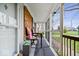 Inviting screened-in porch featuring comfortable seating, stylish decor, and a relaxing outdoor ambiance at 8180 E County Road 400 N, Brownsburg, IN 46112