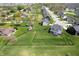 Beautiful aerial view of a home with a large, well-maintained backyard and black metal fence at 8452 Ironhill Ct, Indianapolis, IN 46259