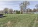 Spacious backyard features a shed and playset at 8926 New Heritage Ct, Indianapolis, IN 46239