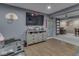 Finished basement space featuring a flat-screen television and wet bar at 8926 New Heritage Ct, Indianapolis, IN 46239