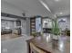 Finished basement features a dining area, a lounge area with leather couches, and a bar area at 8926 New Heritage Ct, Indianapolis, IN 46239