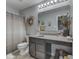 Bathroom featuring ample vanity storage and neutral-colored decor at 8926 New Heritage Ct, Indianapolis, IN 46239