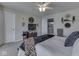 Bedroom features a ceiling fan and a view of an adjacent doorway to the bathroom at 8926 New Heritage Ct, Indianapolis, IN 46239