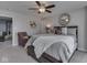Comfortable bedroom featuring a ceiling fan and decorative accents at 8926 New Heritage Ct, Indianapolis, IN 46239
