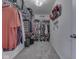 Spacious walk-in closet with ample shelving and hanging space, offering plenty of storage solutions at 8926 New Heritage Ct, Indianapolis, IN 46239